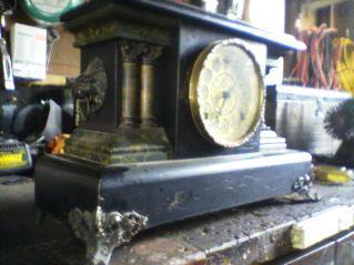 Old Black Mantel Clock