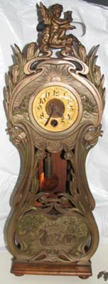 Bronze face of clock - about 15 inches tall