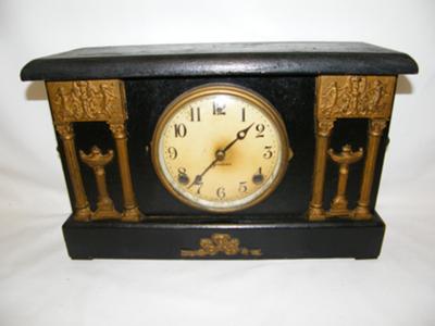 Smelly ( but pretty) Old Clock