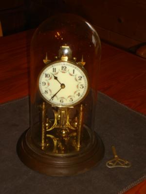 Glass domed Hall Craft clock
